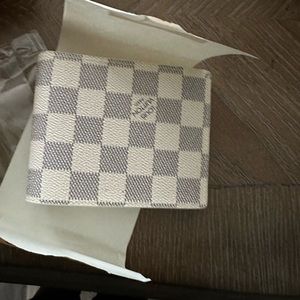 Beautiful wallet vanilla color . Brand new